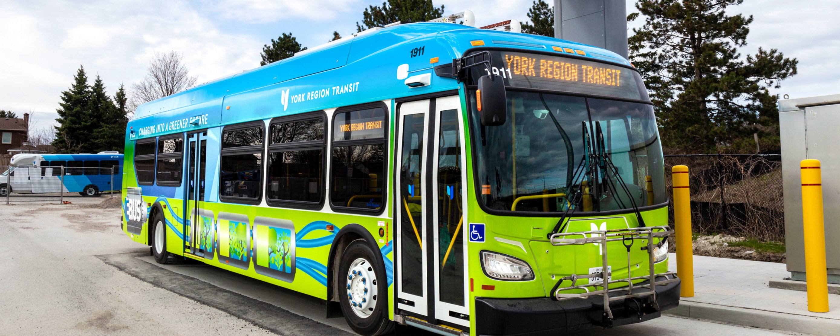 YRT electric bus at a charging station